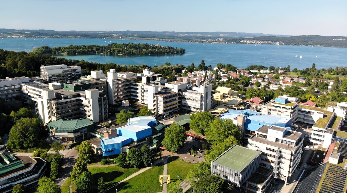 Aerial view showing the university campus, Lake Constance and the island of Mainau. 